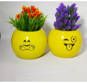 Pair Of Smiley Ceramic Pots